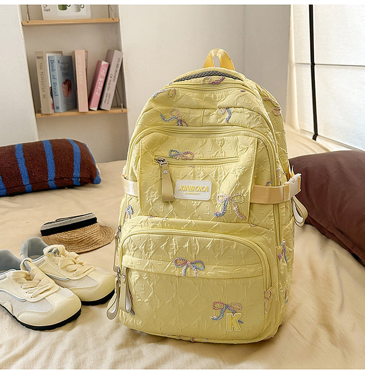 Dekorativer verziierter gesteppten Schulrucksack
