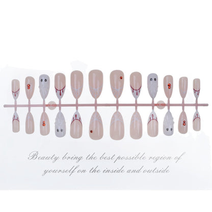 Kreatives thematisches Press-On Nagelset Brehn