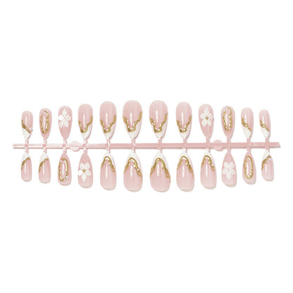 Kunstnagelset mit eleganter Blüten- und Glitzerverzierung Brehn