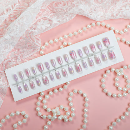 Künstlerisches Press-On-Nagelset mit himmlischen Designs