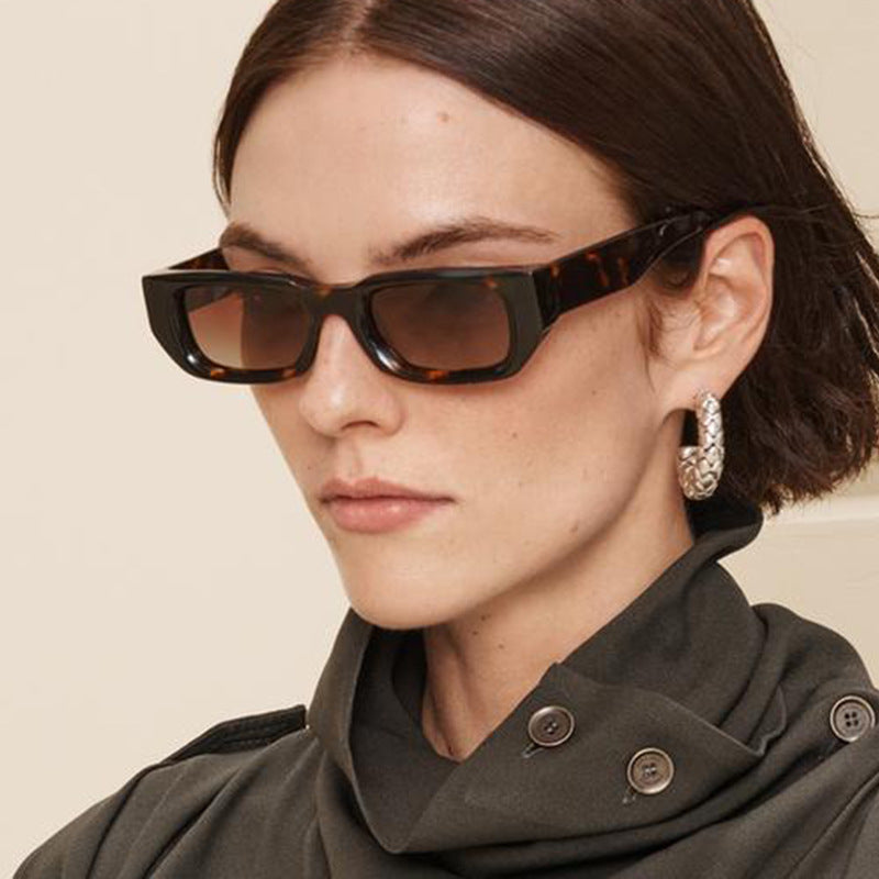 Damen modische Sonnenbrille mit innovativem, transparentem Rahmen und polarisierten Gläsern Brehn