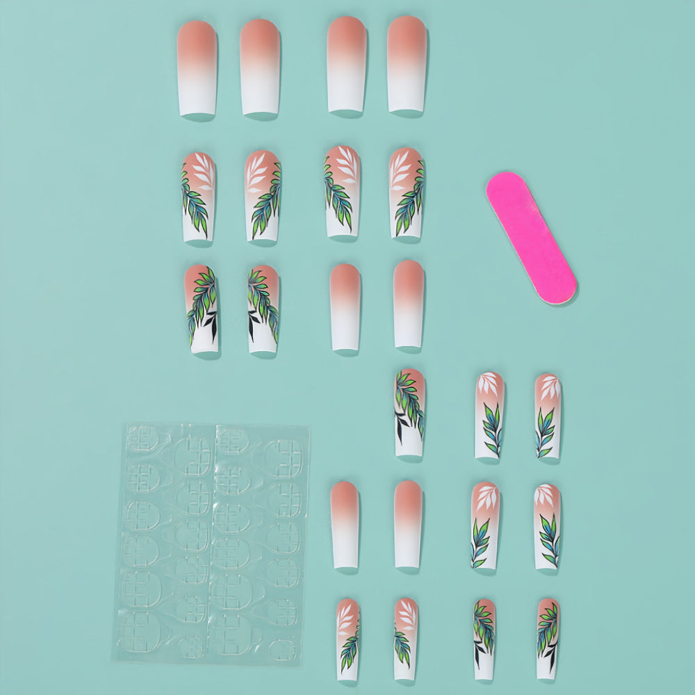 Kunstnägel mit elegantem Ombre-Design und floralen Akzenten Brehn