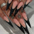 Künstlerische Stiletto-Nagelverlängerungen mit strukturierten Details Brehn