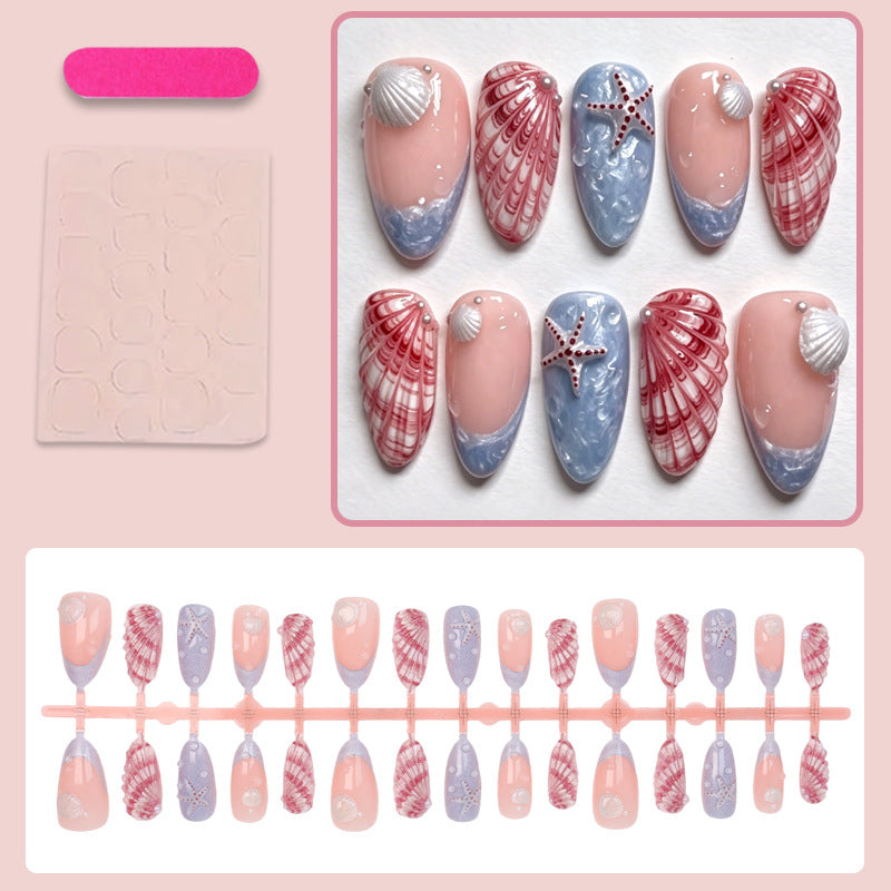 Kunstnagelset mit maritimen Muschel- und Sternenmotiven Brehn