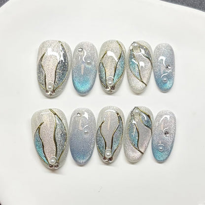 Elegantes dekoratives Press-On-Nagelkunst-Set mit Perlen- und Blattelementen Brehn