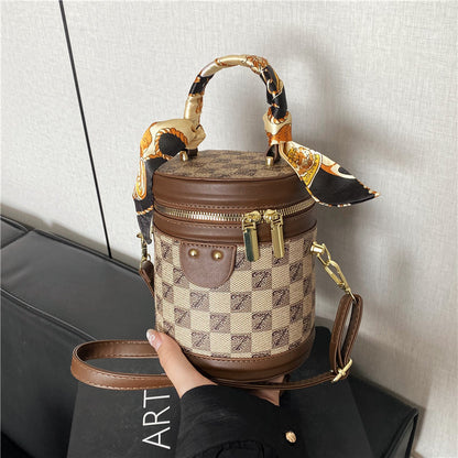 Dekorative runde Handtasche