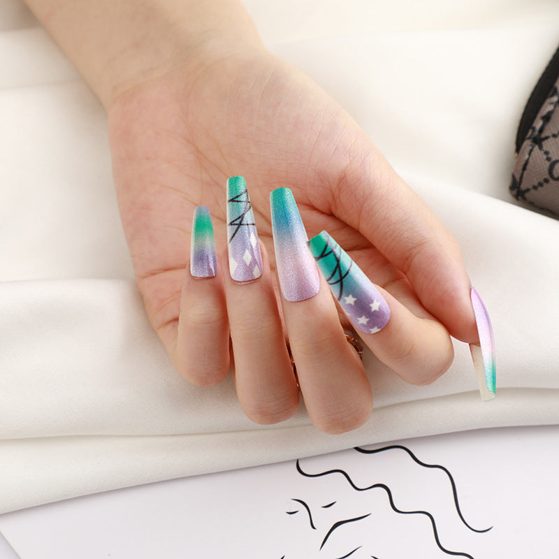 Kunstnägel mit Sternen- und Mond-Design Brehn