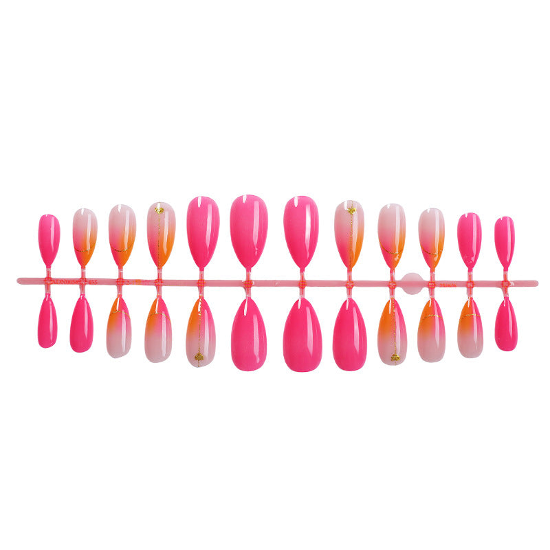 Press-On Nail Set mit lebhaftem Farbverlauf-Design und goldenen Akzenten Brehn