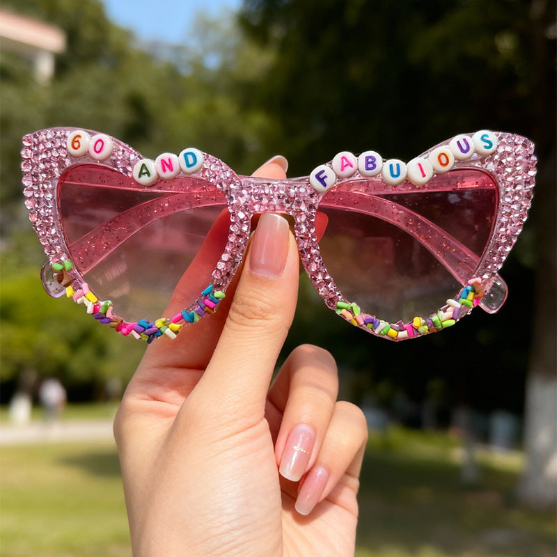 Dekorative Katzenaugen-Sonnenbrille mit Rhinestones Brehn