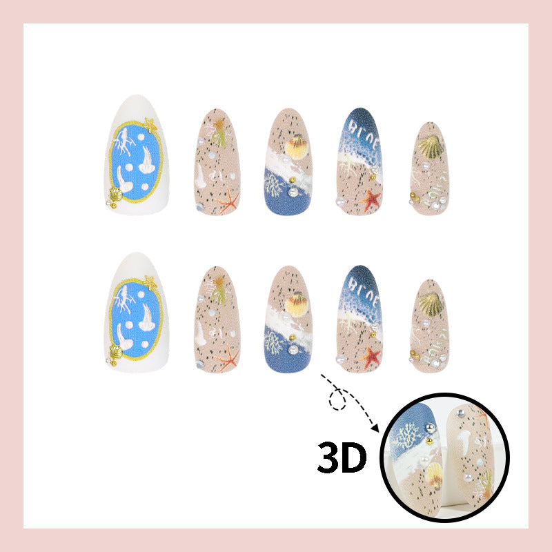 Kunstnagelset mit maritimen Designs und eleganten Verzierungen Brehn