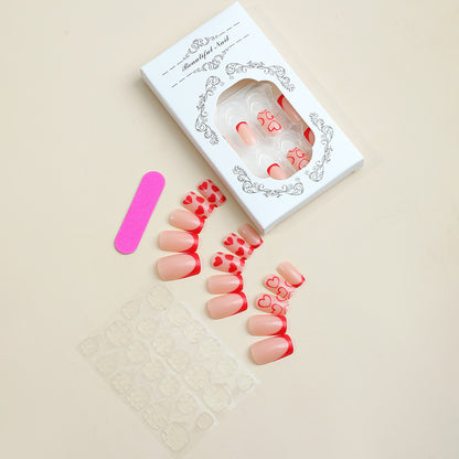Kreatives Kunstnagelset mit Herzen und Spitzen Design Brehn