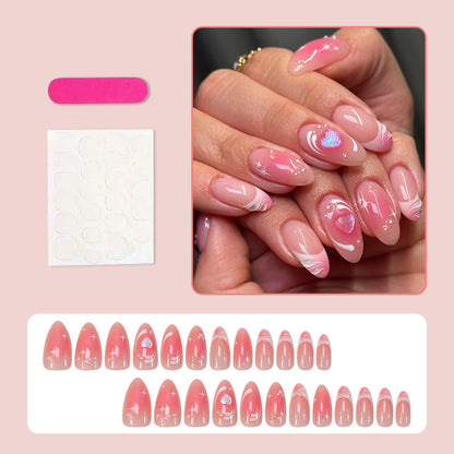 Kunstnagelset mit romantischem Herz-Design und Glitzerakzenten Brehn