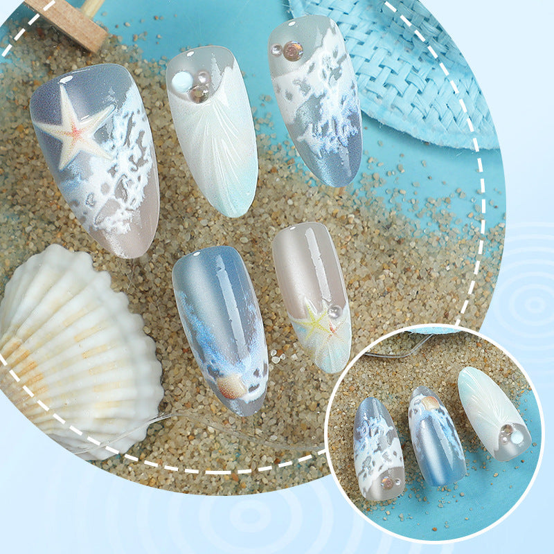 Kunstnägel mit maritimem Muschelmuster Brehn
