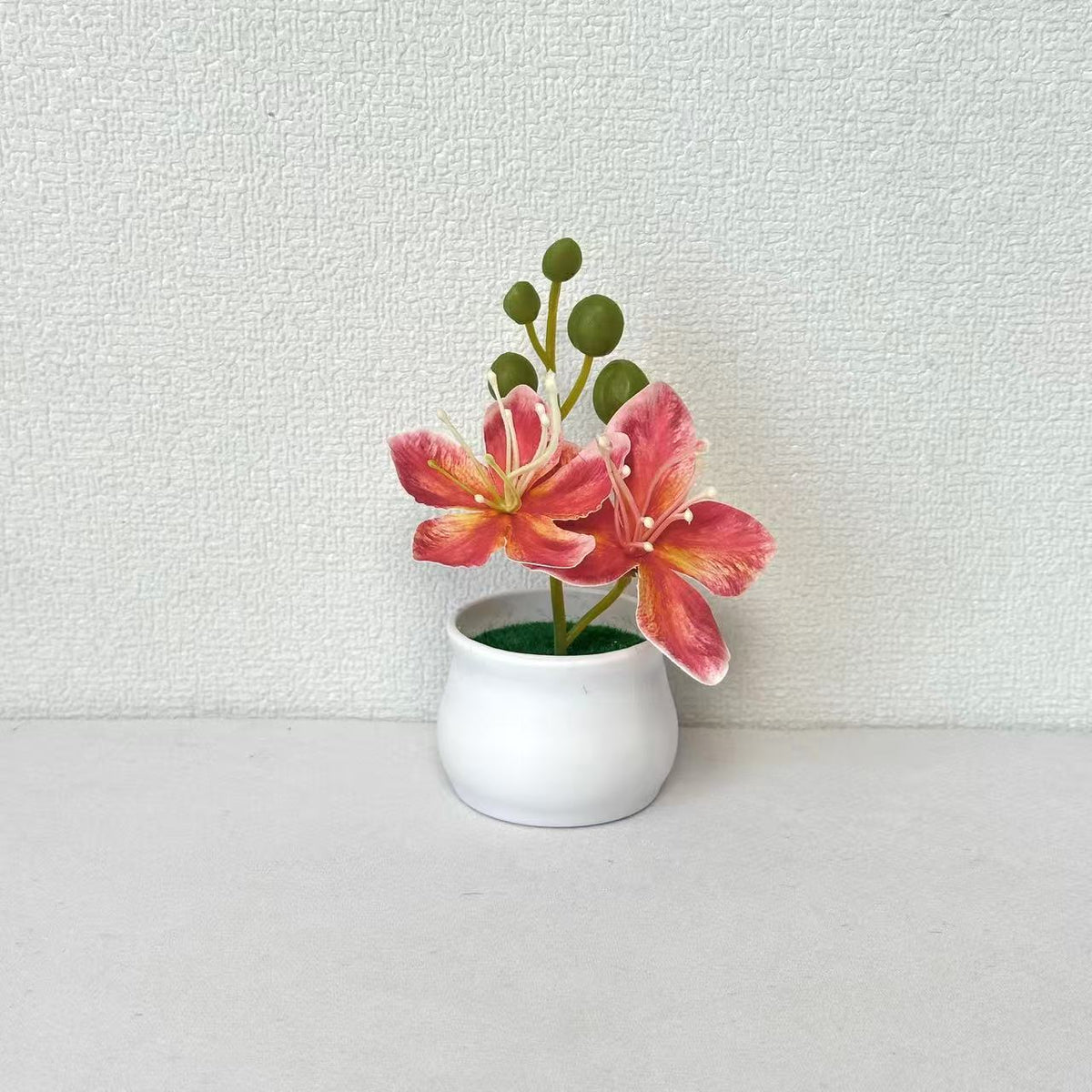 Elegantes Miniatur-Blumengesteck