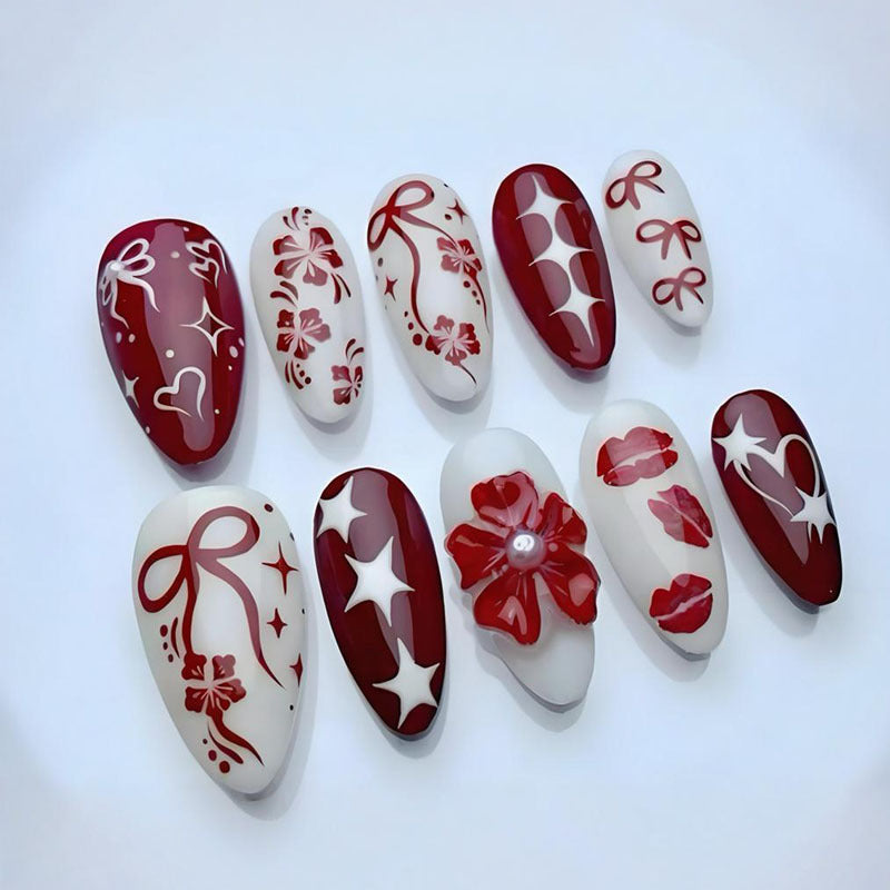 Kunstnagelset mit romantischen Herz- und Blütenmotiven Brehn