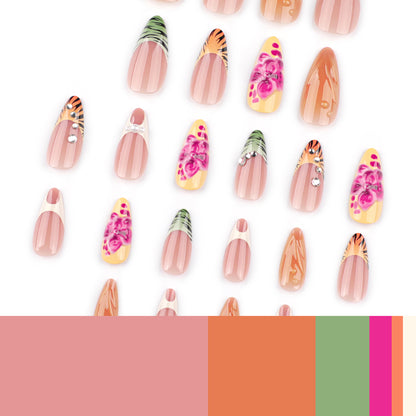 Kunstvolle Stiletto-Nägel mit buntem Blüten-Design und Glitzer Brehn
