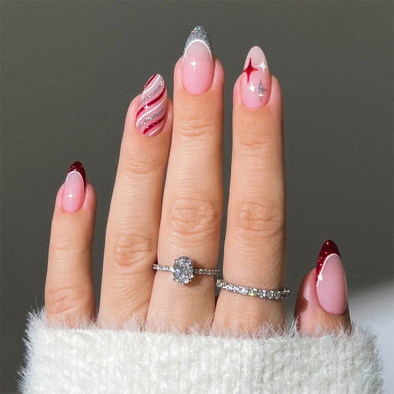 Dekorativer Press-On-Nagelset mit Glitzer und gestreiftem Design Brehn