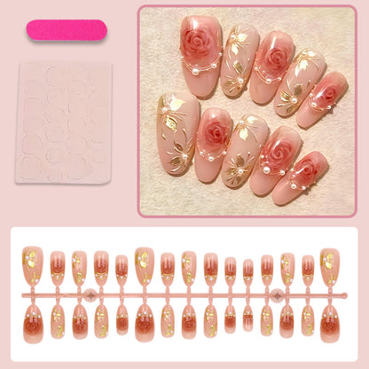 Kunstnagelset mit romantischen Rosenmotiven und goldenen Verzierungen Brehn