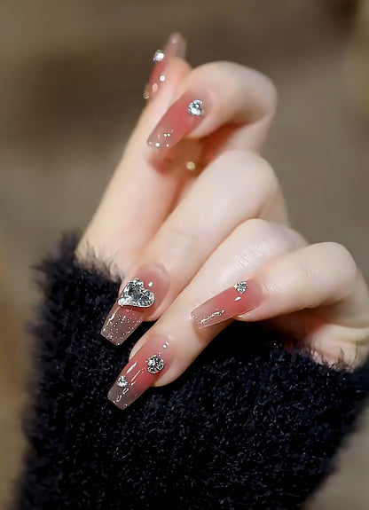 Kunstnagelset mit eleganten Herz- und Strassverzierungen Brehn