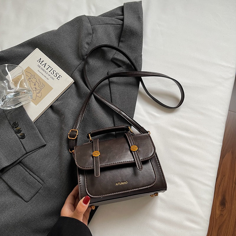 Kompakte Lederhandtasche Brehn