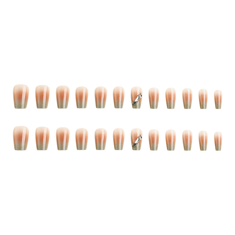 Kunstnagelset mit elegantem Ombre-Design und funkelnden Applikationen Brehn