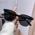 Damen modische Sonnenbrille im minimalistischem Design Brehn