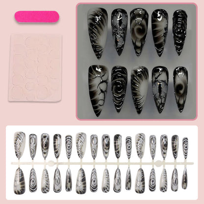 Kunstnagelset mit modernem Spiralmuster und glänzenden Akzenten Brehn