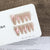 Elegantes Press-On-Nagelkunst-Set mit floralem Design Brehn