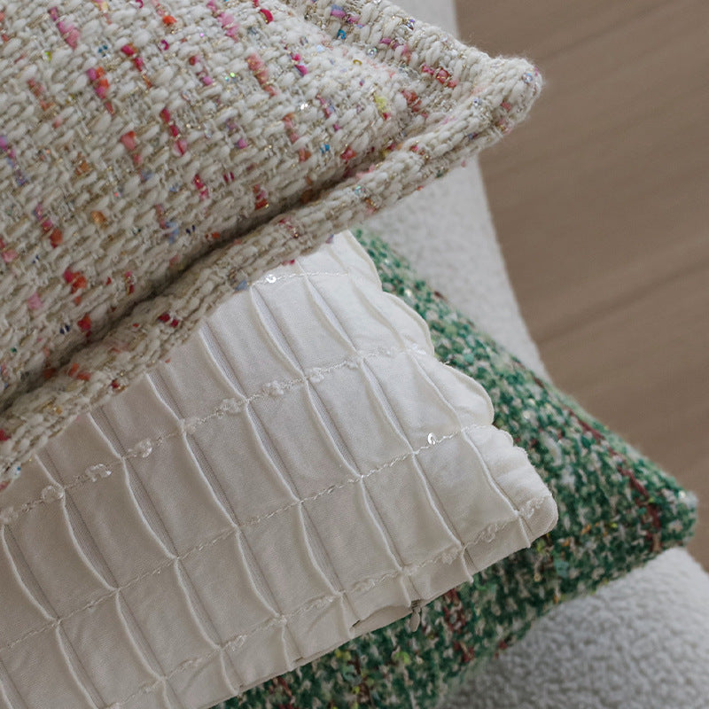 Quadratischer Bouclé-Kissenbezug im Tweedstil mit dezentem Multicolor‑Tufting Brehn