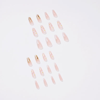 Kunstvolle Nagelverlängerungen mit floralen Designs und Glitzerakzenten Brehn