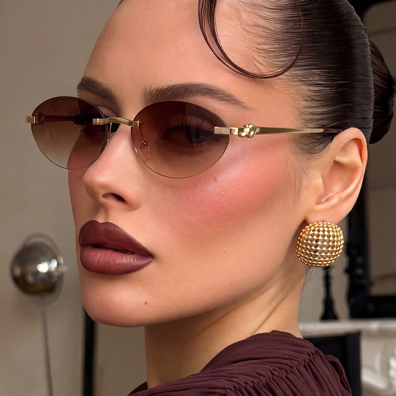 Damen elegante ovale Sonnenbrille mit goldenen Akzenten Brehn