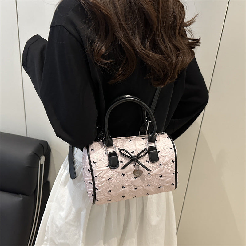 Bogen-verzierte Handtasche