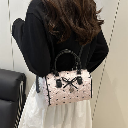 Bogen-verzierte Handtasche