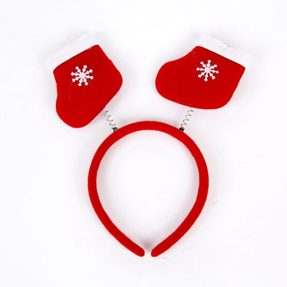 Festlicher Weihnachts-Haarreif mit lustigen Weihnachtsmannfiguren