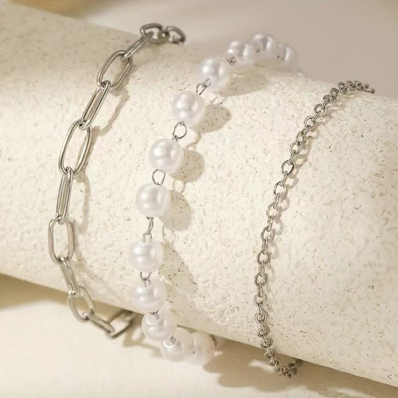 Elegantes Schichten Perlen- und Kettenarmband-Set Brehn