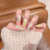 Stilvolles Press-On-Nagelset mit floralem Design Brehn