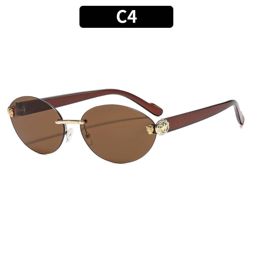 Vintage ovale Sonnenbrille mit goldenen Akzenten