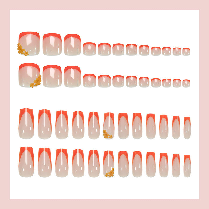Kunstnagelset mit stilvollen orangen Neon-Akzenten Brehn