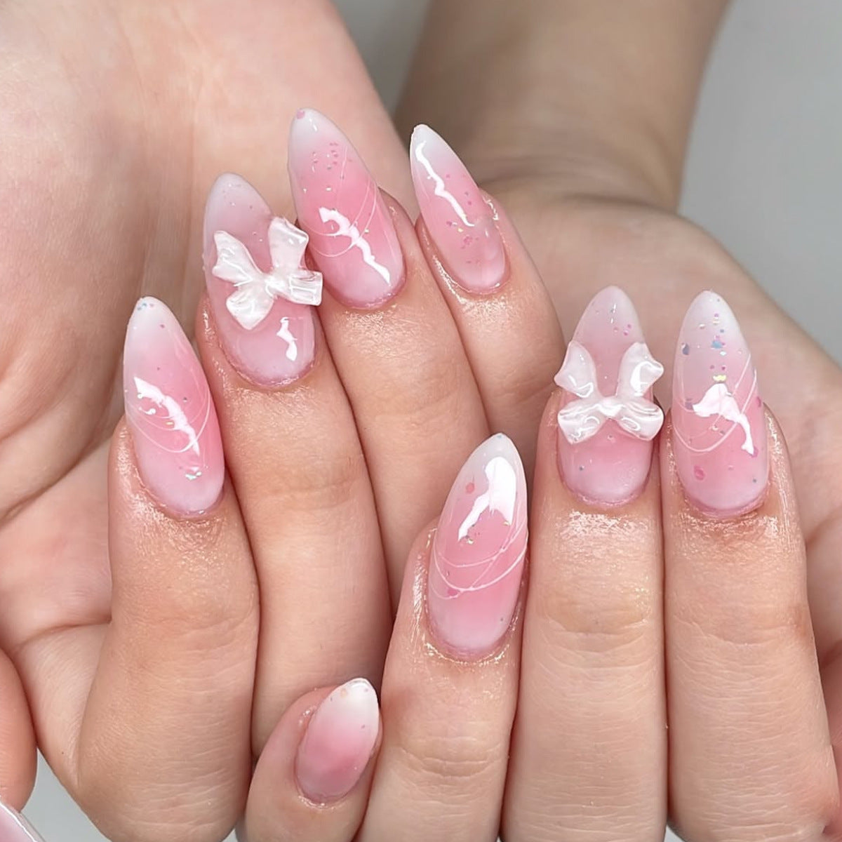Elegante 3D Schleifenakzent Nagelkunstverlängerungen Brehn