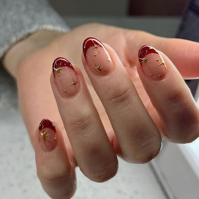 Kunstnagelset mit glamourösen Sternenmotiven und elegantem Farbverlauf Brehn