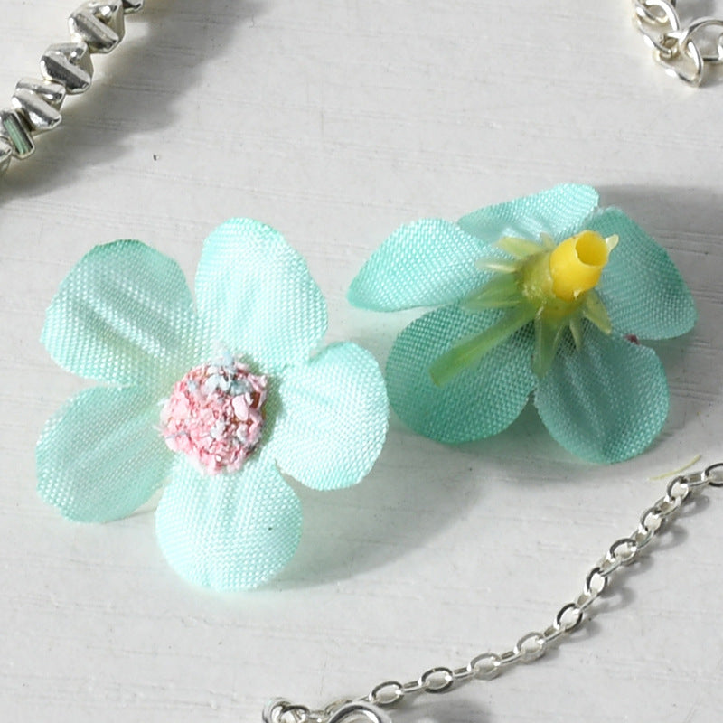 Glitzernde Blumen-Haaraccessoires