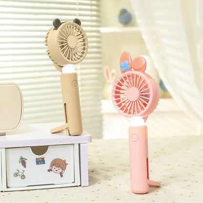 Damen tragbarer Handventilator mit integriertem LED-Licht und Tierohr-Design Brehn