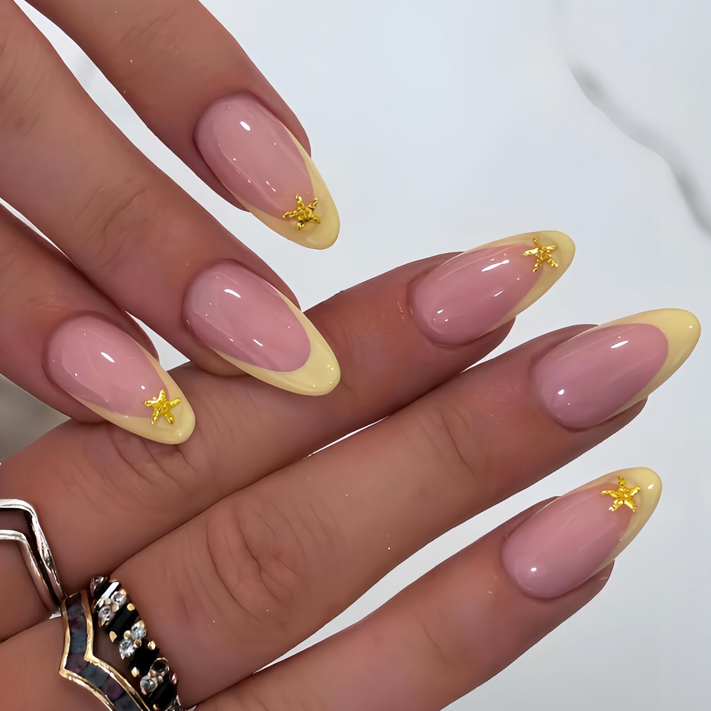 Elegante Stiletto-Nagelkunst-Tipps mit Seestern-Akzenten Brehn
