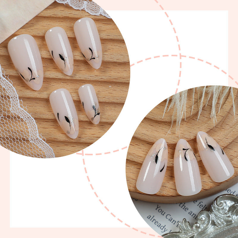 Dekorativer Press-On Nagelset mit künstlerischem Blumenmuster Brehn