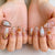 Kunstnagelset mit filigranen Blüten- und Glitzerverzierungen Brehn
