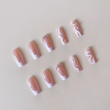 Kunstnagelset mit elegantem French Design und kreativen Akzenten Brehn