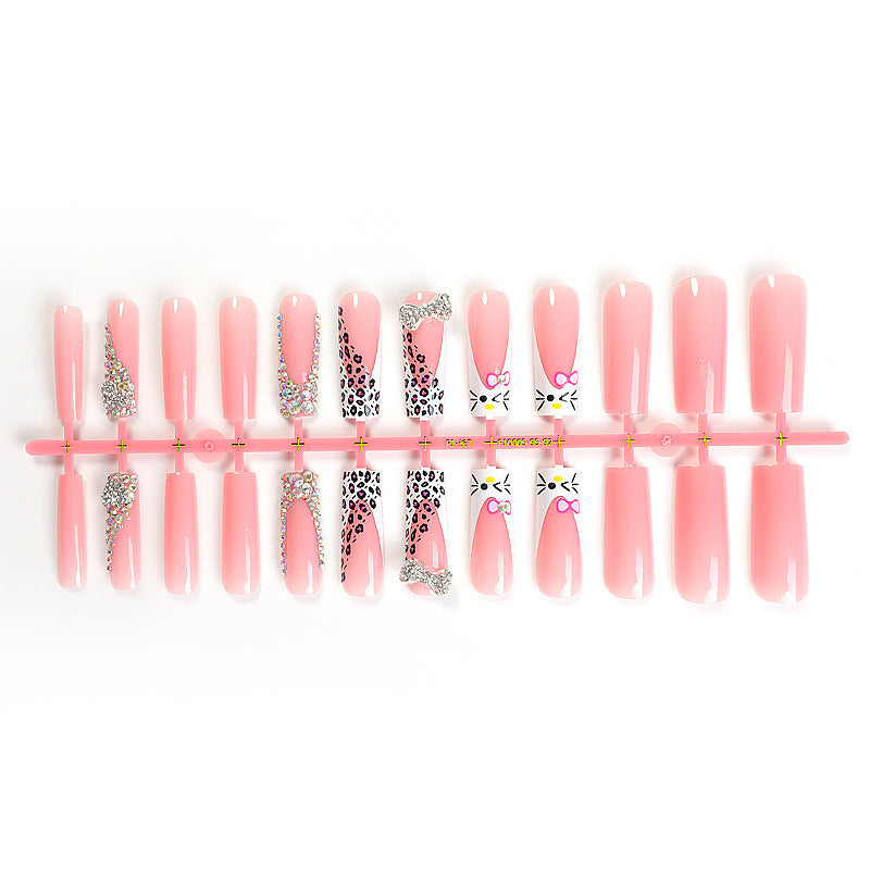 Glamouröses Kunstnagelset mit funkelnden Strassverzierungen und kreativen Tiermotiven Brehn