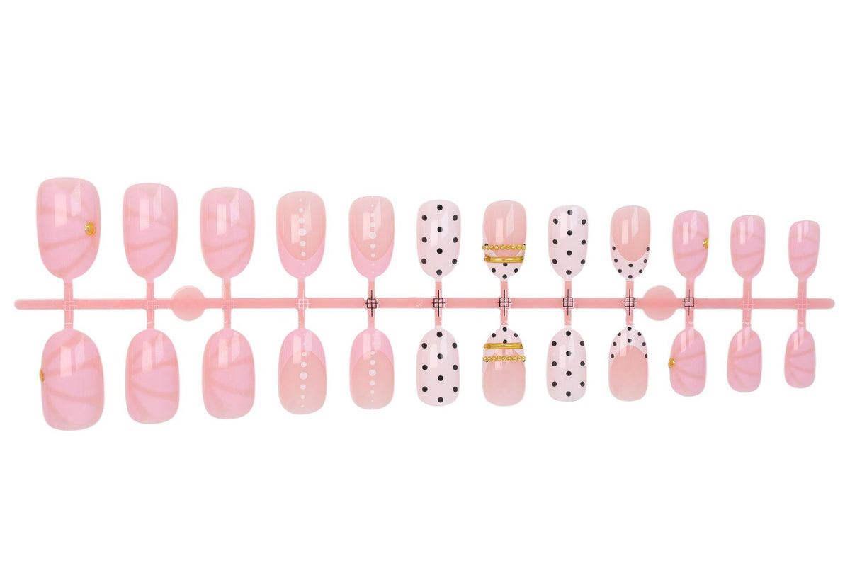 Kunstnagelset mit elegantem Polka-Dot und glamourösen goldenen Akzenten Brehn