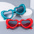 Damen Herzförmige Sonnenbrille mit stylischem Rahmen Brehn