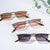 Damen elegante geometrische Sonnenbrille mit stylischem Metallrahmen Brehn